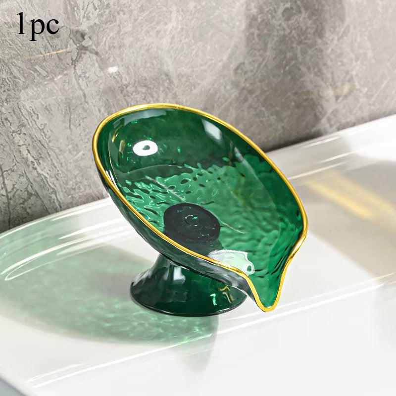 Green oval plastic soap dish