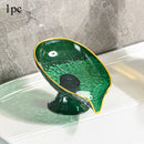 Green oval plastic soap dish