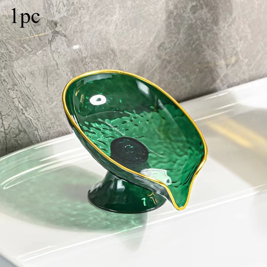 Green oval plastic soap dish